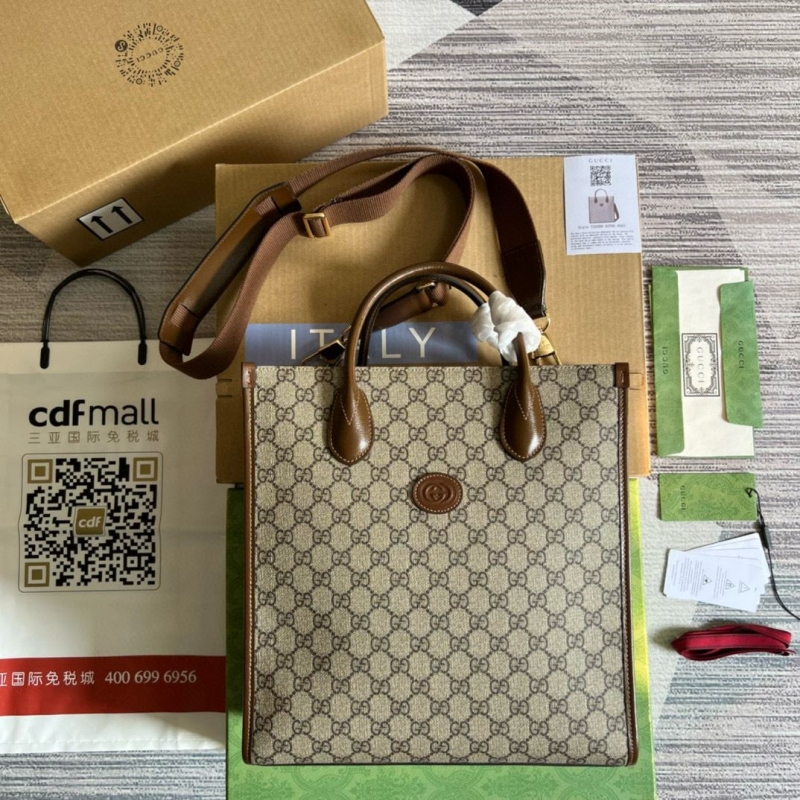 G*u*i shopping bags